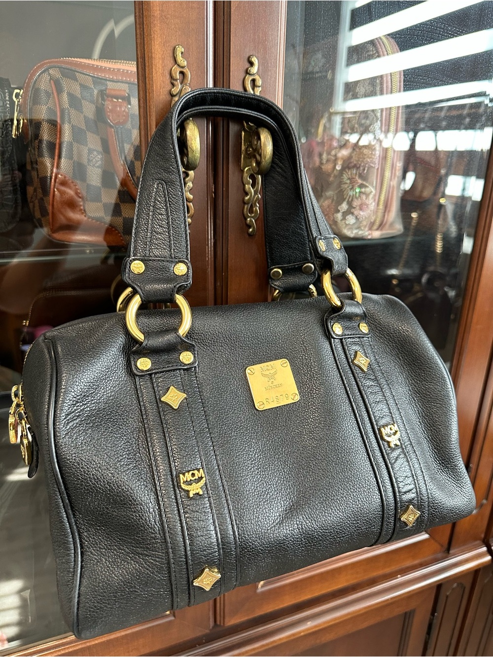 MCM Black Leather Duffel Bag with Gold Hardware